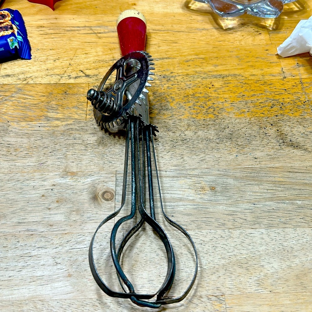 Vintage A&J red handle hand mixer, pat 1923.  Excellent condition, works great.